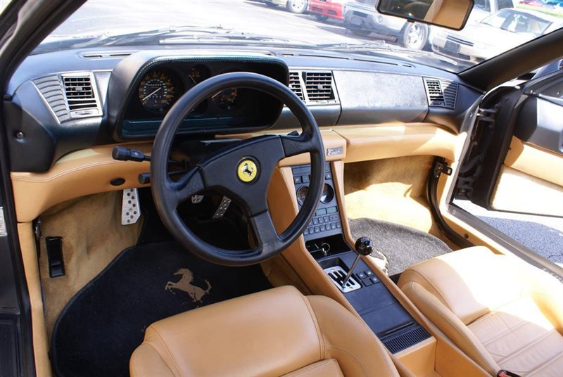 Illustration for article titled Does This Cheap Ferrari Deserve To Be Rescued From Its Tasteless Owner?